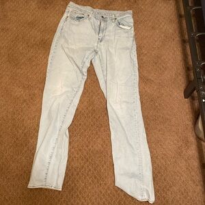 Levi’s 541 that have a small orange stain.